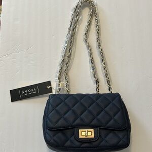 Scratch and Water Resistant Shoulder
Bag Navy Blue Mini Quilted VEGAN
LEATHER